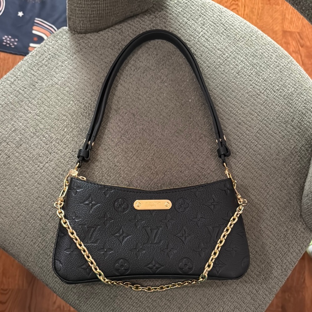 Louis Vuitton Liv Pochette in Monogram Empreinte Leather